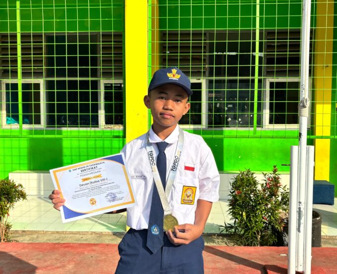 Devan Devian Putra Raih Juara 1 Tanding Kelas C Putra pada TGPDC